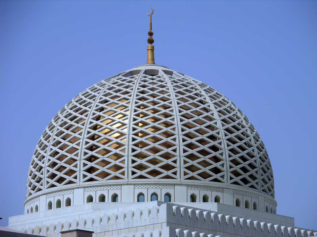 Muscat 04 Grand Mosque 02 Dome Closeup Outside The Arabic word for mosque is `masjid' (place of prostration). The holy day of the Islamic week is Friday when all Muslim men are commanded to go to the mosque for prayer (women can perform their prayers at home). The  central dome rises to a height of 50m, topped with a crescent moon.